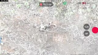 A Russian soldier is trying to kill himself with barbed wire