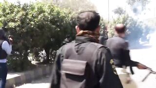 Fearless Idiot Attacks Police Officers During Protest And Gets Clubbed