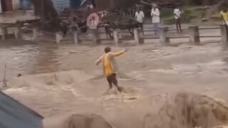 Man Drowns During Flood In India, Crowd Enjoys The Show