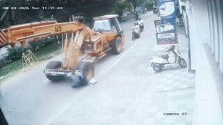 Pedestrian Gets His Head Popped By Crane