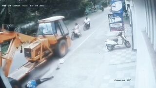 Pedestrian Gets His Head Popped By Crane