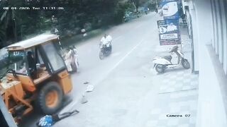 Pedestrian Gets His Head Popped By Crane
