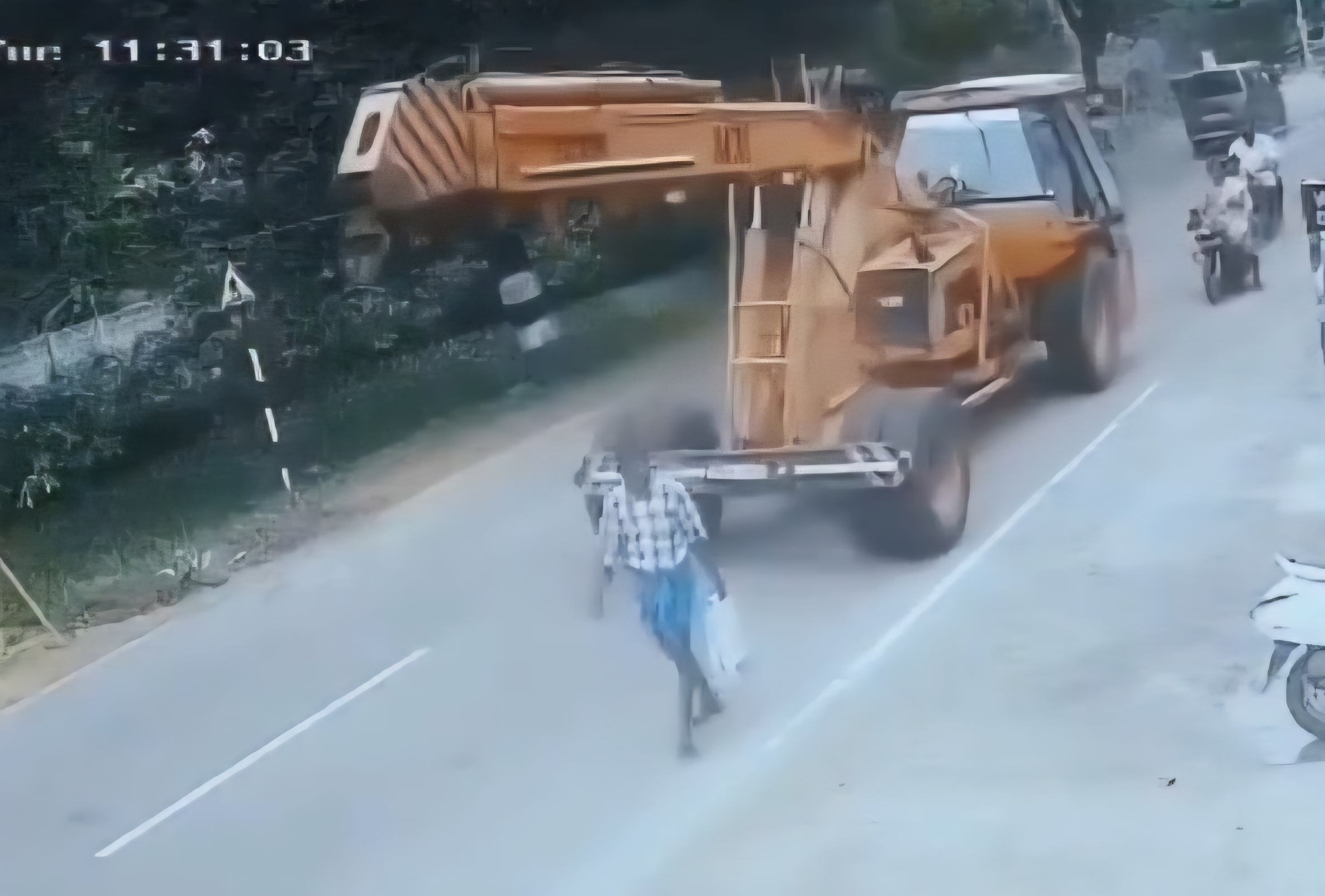 Pedestrian Gets His Head Popped By Crane