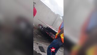 Worker Gets Crushed Between Two Trucks In Jamaica
