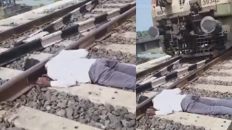 Decapitated Man Lying On Tracks As Trains Pass By