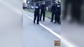 Man Unfazed By Police Batons