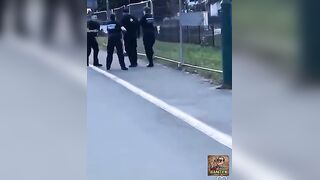 Man Unfazed By Police Batons
