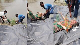 Drowned Indian woman's body