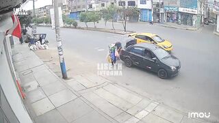 Woman Loading Trunk Mid-Road Struck by Vehicle In Peru