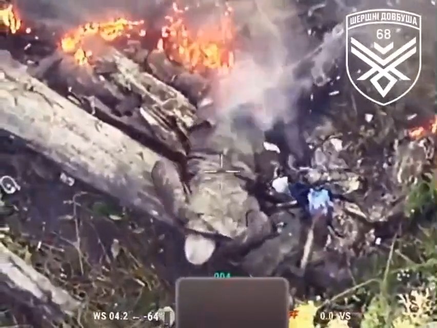 Burning legless katsapfaggot crawling out from fire and drinks from a bottle