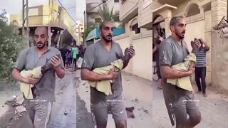MAN WALKS WITH ONE ARM IN HIS HANDS