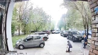 Man commits suicide in russia nearly hitting a child (CLASSIC VIDEO)