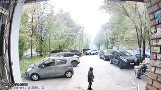 Man commits suicide in russia nearly hitting a child (CLASSIC VIDEO)