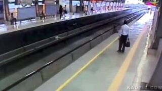 Man stands on tracks, ends up getting crushed between the train and a platform(CLASSIC)