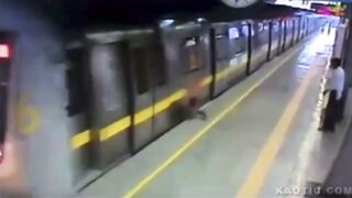Man stands on tracks, ends up getting crushed between the train and a platform(CLASSIC)