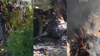Burning ruzky corpse inside a "bukhanka" van.