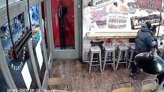 Two Man Fights With A Sword Inside Shop