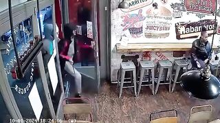 Two Man Fights With A Sword Inside Shop