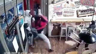 Two Man Fights With A Sword Inside Shop
