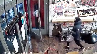 Two Man Fights With A Sword Inside Shop