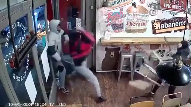 Two Man Fights With A Sword Inside Shop