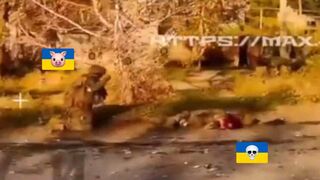 Dumbass Ukrat prays for his decapitated friend.