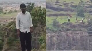 Parents try to stop son from suicide; all 3 fall to death