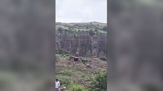 Parents try to stop son from suicide; all 3 fall to death