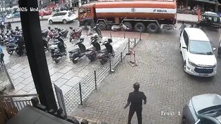 Moped Rider Slips, Falls And Gets Run Over By Tunker Truck