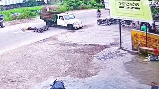 India: Garbage Truck Reverses Into Biker, E-Rickshaw Dodges Death