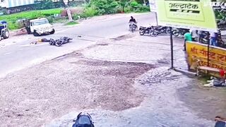 India: Garbage Truck Reverses Into Biker, E-Rickshaw Dodges Death