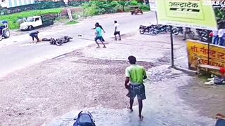 India: Garbage Truck Reverses Into Biker, E-Rickshaw Dodges Death