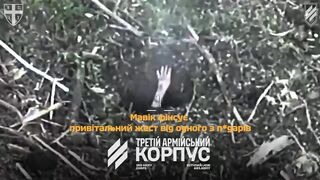 Hand of choking ruzky invader in burning dugout blasted by a small ground robot