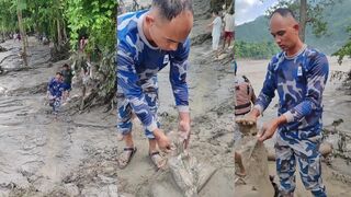 Rescuers find a foot in the Nepali flood waters