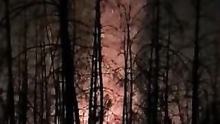 Dirty katsaps filming burning their ammo deposit after Ukrainian deep drone strike