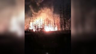 Dirty katsaps filming burning their ammo deposit after Ukrainian deep drone strike