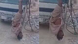 Pakistan: Marble factory owner hanging a worker upside down from crane