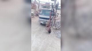 Pakistan: Marble factory owner hanging a worker upside down from crane