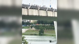Suicidal Girl Jumps From The Bridge In China