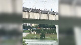 Suicidal Girl Jumps From The Bridge In China