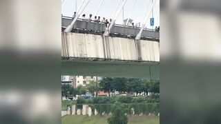 Suicidal Girl Jumps From The Bridge In China