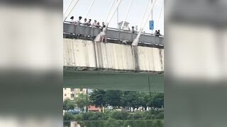 Suicidal Girl Jumps From The Bridge In China