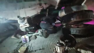 Vehicle slipped off the jack crushing the two people