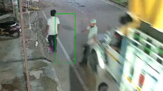 Man walking on road dies instantly when his head is crushed by a truck