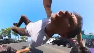Biker Crushed Into Pedestrian