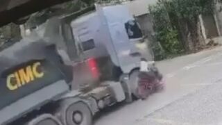 TERRIBLE Way To Go: Motorcyclist Gets Crushed By Truck