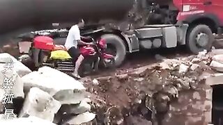 Old man falls into a pit trying to avoid truck