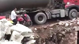 Old man falls into a pit trying to avoid truck