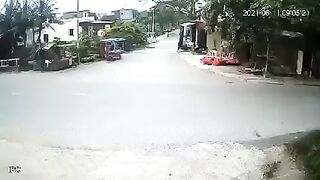 Small Truck Sweeps Up A Cyclist