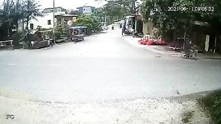 Small Truck Sweeps Up A Cyclist